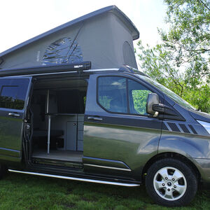 Ford Transit met hefdak